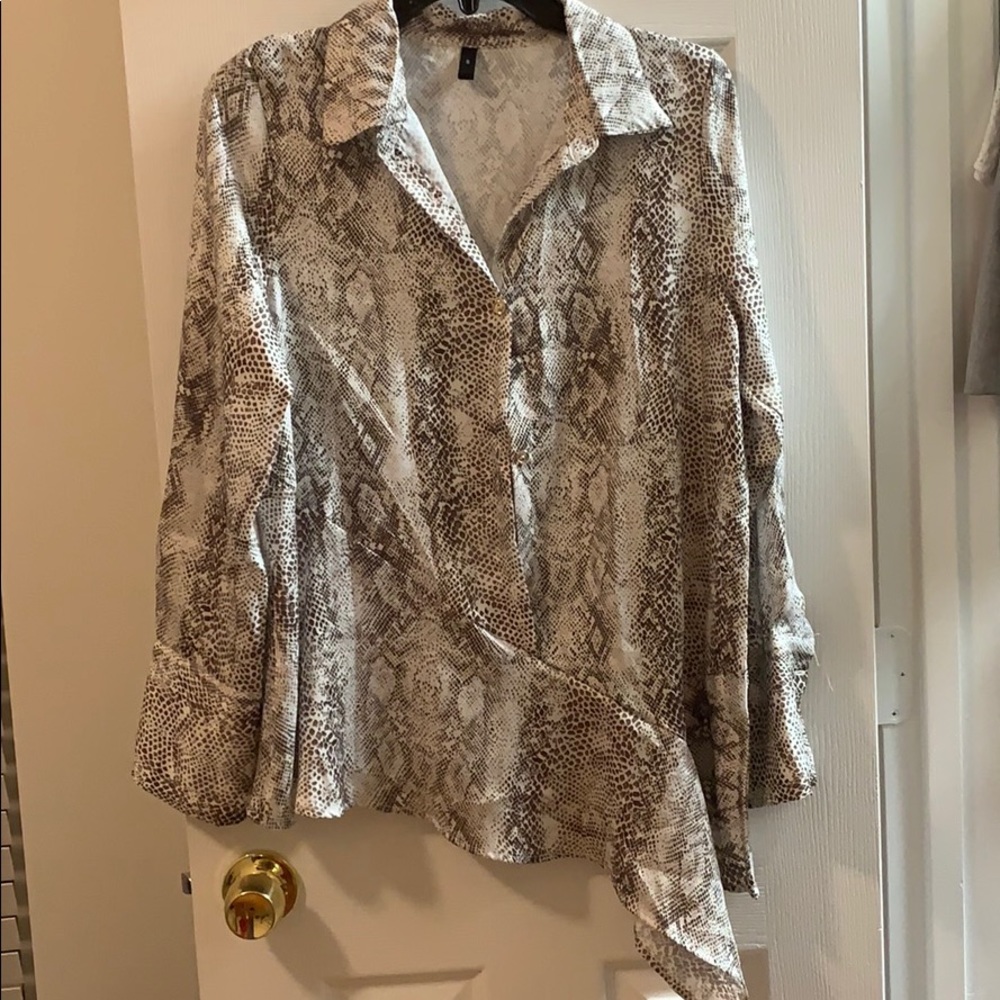 Asymmetrical animal print button down blouse